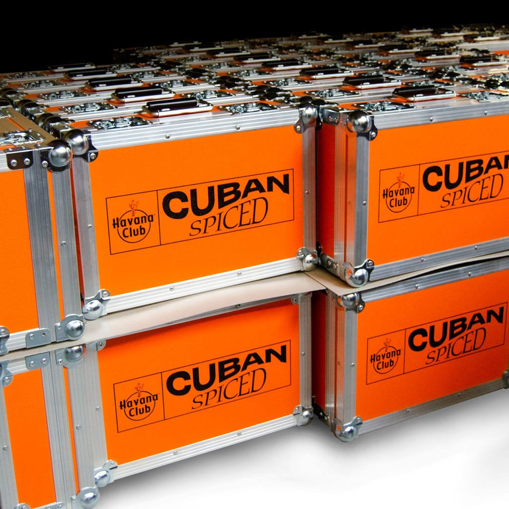 orange branded promotional flight cases with black logo