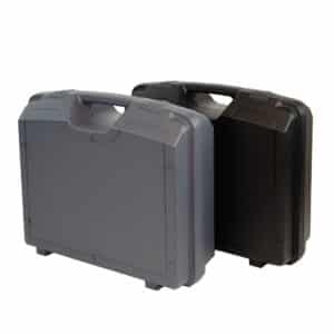 Two hard-shell carrying cases with molded handles, one gray and one black, standing side by side for transport or storage of tools or equipment, rugged plastic design.
