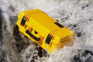 waterproof yellow peli storm case in water