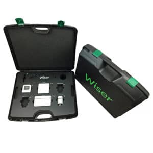 Open black carrying case labeled'Wiser' showing a modular testing kit with white modules and connectors in foam inserts